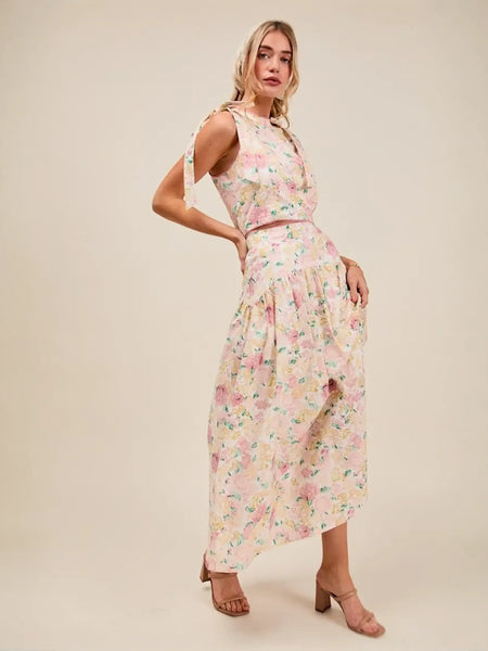 Trendsi breathable vacation outfit for women featuring a floral sleeveless skirt set with tie shoulder details