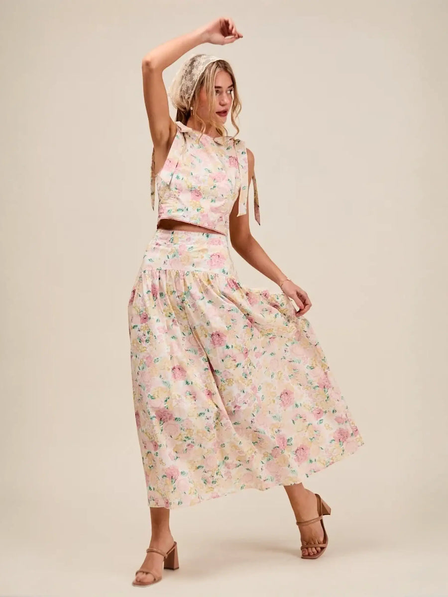 Trendsi floral skirt set featuring a sleeveless top and flowy midi skirt breathable vacation outfit for women