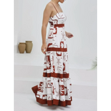 maxi dress in brown and white with floral patterns, styled as a blue and white beach dress alternative