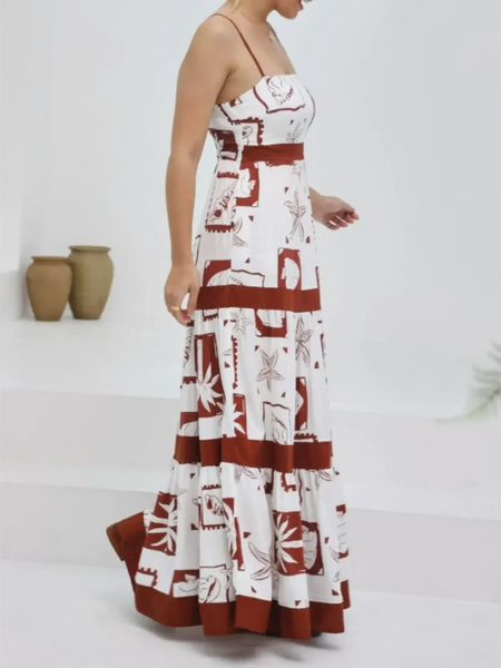 maxi dress in brown and white with floral patterns, styled as a blue and white beach dress alternative