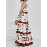 maxi dress in white with brown patterns, sleeveless and floor-length for casual wear