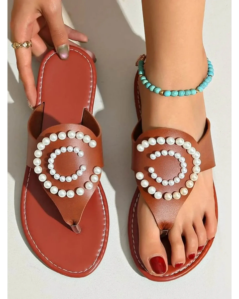 Babe Beachwear brown pearl embellished sandals with circular pearl design worn on foot with turquoise anklet