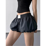 Babe Beachwear casual black Bubble Shorts-Summer 2025 with elastic waistband worn with a black top