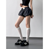 Babe Beachwear Bubble Shorts-Summer 2025 in black casual puffed design worn with white knee socks and black sneakers