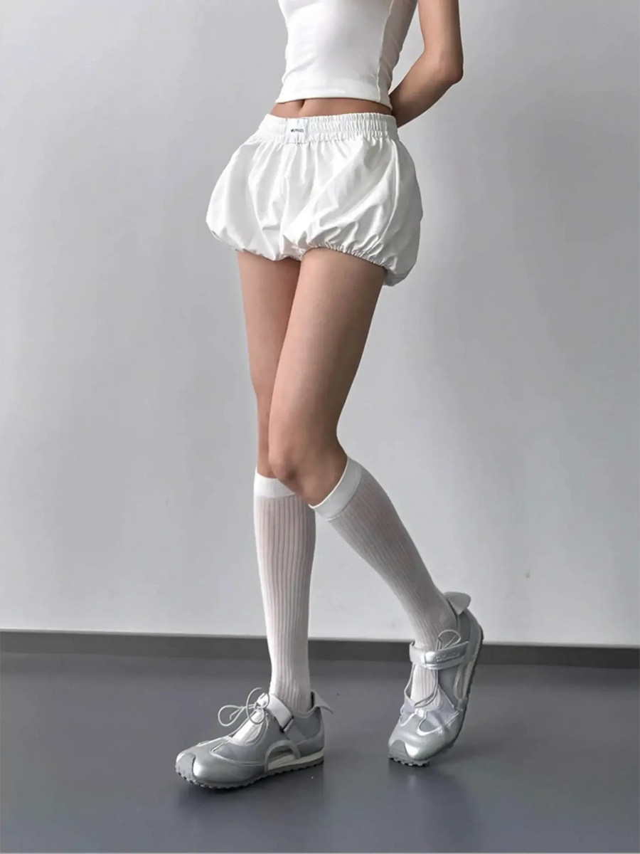 White casual Babe Beachwaer Bubble Shorts-Summer 2025 with elastic waistband styled with knee-high socks and sneakers