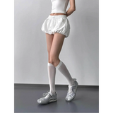 White casual Babe Beachwaer Bubble Shorts-Summer 2025 with elastic waistband styled with knee-high socks and sneakers