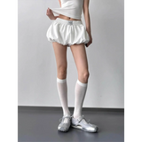 Babe Beachwear casual white Bubble Shorts-Summer 2025 with elastic waistband styled with white knee-high socks and silver shoes