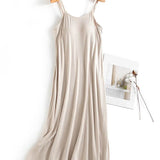Trendsi Beige Built-In Bra Shelf Midi Dress with Spaghetti Straps and Flowing Fabric