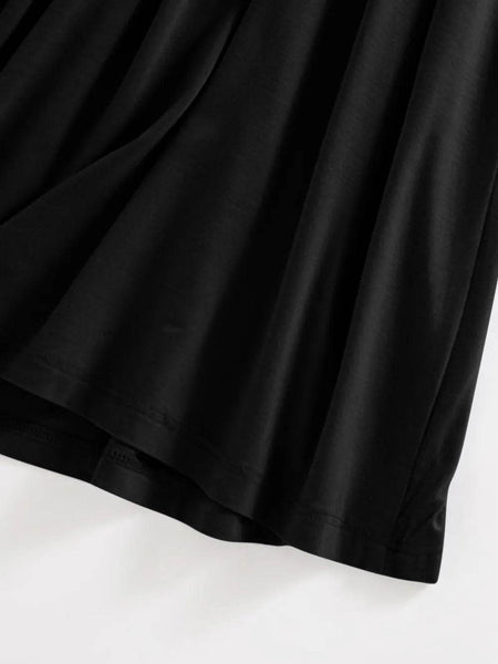 Close-up of black fabric and hem detail of Trendsi Built-In Bra Shelf Midi Dress