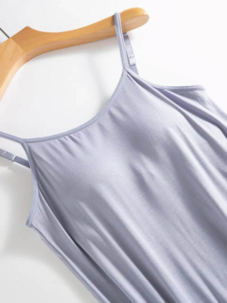 Light purple Trendsi Built-In Bra Shelf Midi Dress with thin adjustable straps on wooden hanger
