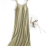 Trendsi Built-In Bra Shelf Midi Dress in light olive with adjustable spaghetti straps on wooden hanger