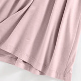 Close-up of soft pink fabric detailing the hem of the Trendsi Built-In Bra Shelf Midi Dress
