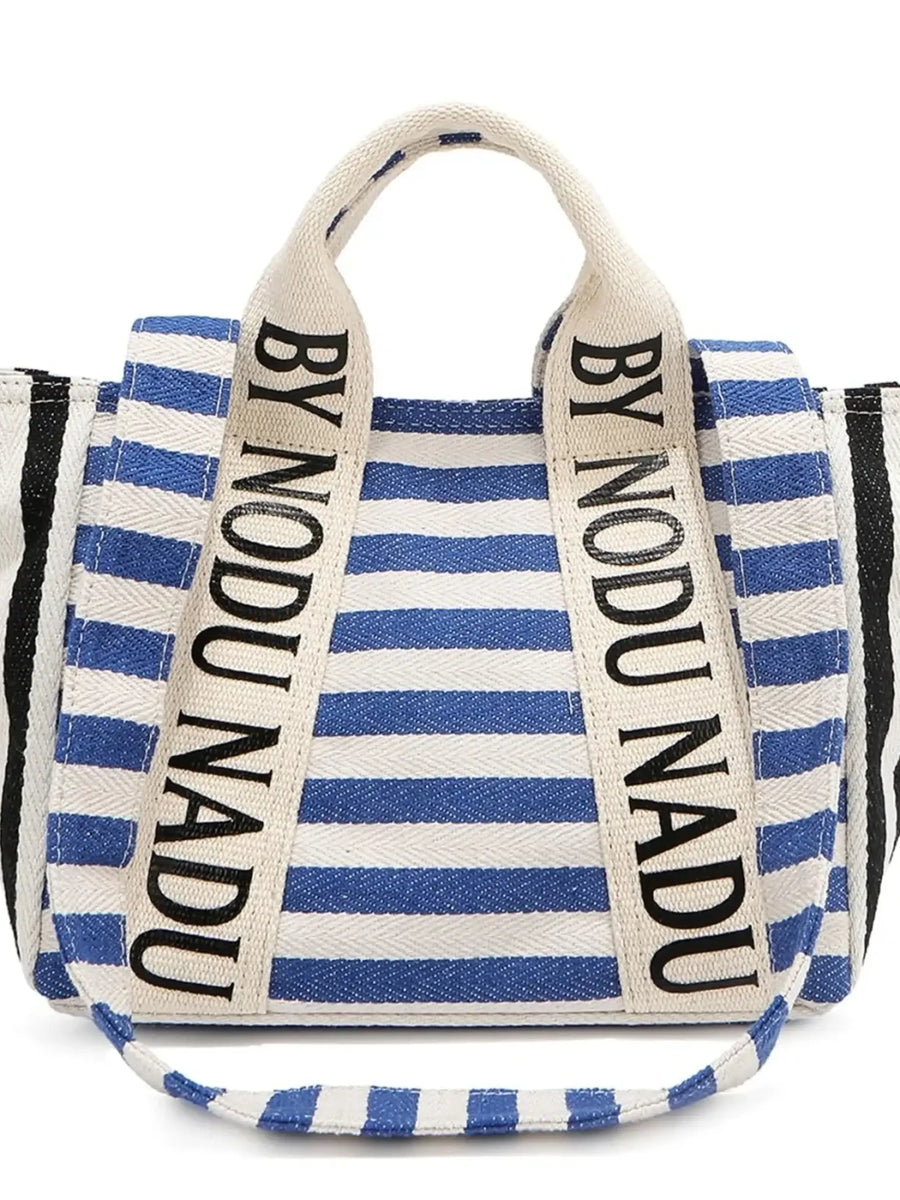 Chic summer tote for women by Babe Beachwaer featuring blue and black striped design with bold text handles