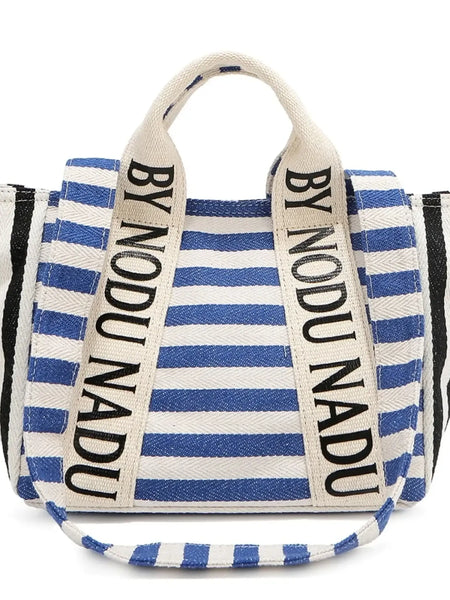 Chic summer tote for women by Babe Beachwaer featuring blue and black striped design with bold text handles