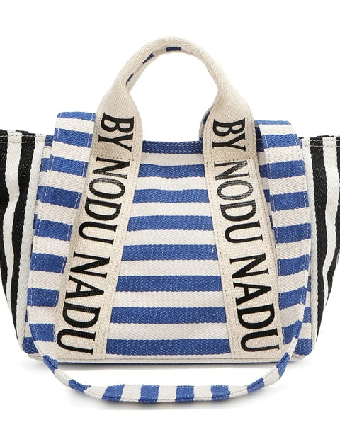 Chic summer tote for women by Babe Beachwaer featuring blue and black striped design with bold text handles
