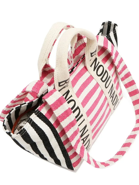 Babe Beachwear chic summer tote for women with pink and black striped pattern and white handles