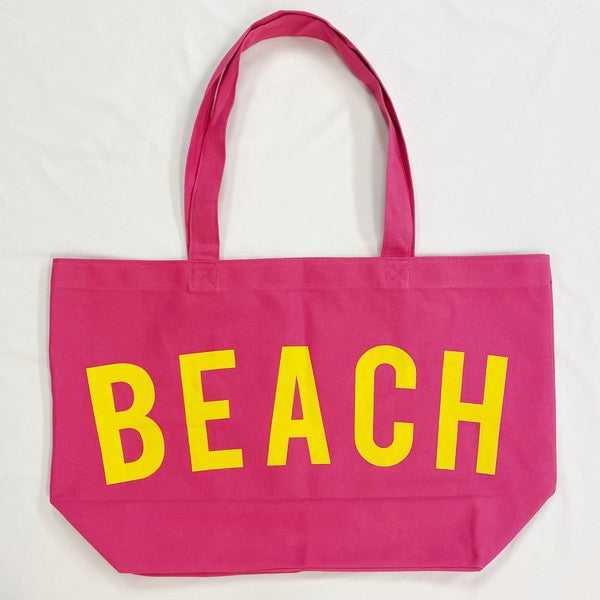Pink Canvas Beach Tote bag by Babe Beachwaer with large yellow BEACH text and dual shoulder straps