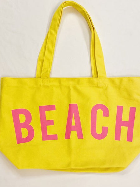 Babe Beachwear yellow Canvas Beach Tote with pink BEACH text and shoulder straps