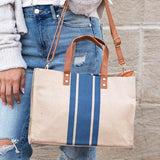 Canvas Stripe Tote for 2025 Summer Resort Wear by Babe Beachwear with blue stripes and brown leather handles