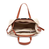 Open Babe Beachwaer Canvas Stripe Tote for 2025 Summer Resort Wear showing interior compartments and brown handles