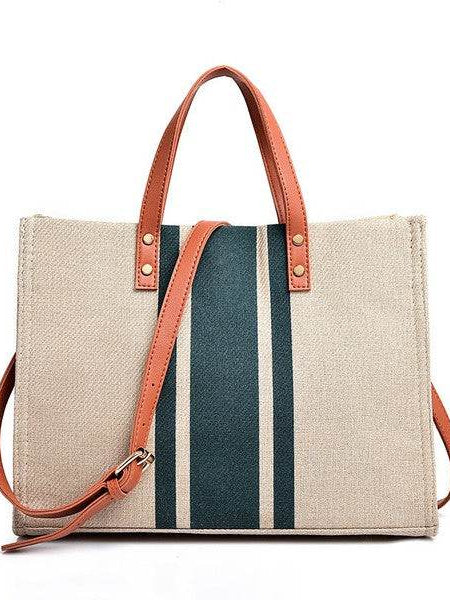 Babe Beachwear Canvas Stripe Tote for 2025 Summer Resort Wear with brown leather handles and blue striped design