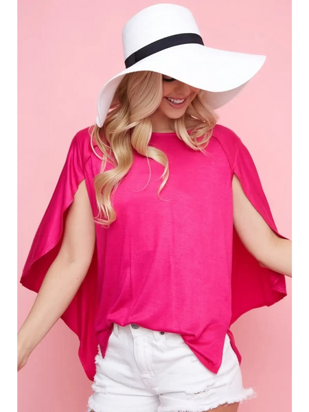 Trendsi bright pink short sleeve Cape Style Shirt with flowing cape design worn with white shorts and a wide brim hat