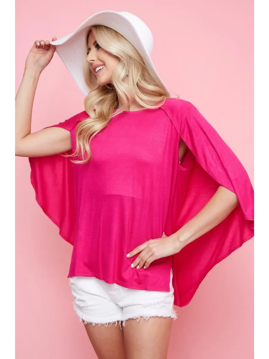 Trendsi bright pink short sleeve Cape Style Shirt worn by woman with white hat and shorts