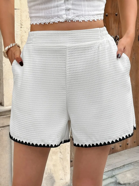 White waffle-textured shorts with black trim for curvy queens, perfect for summer vibe