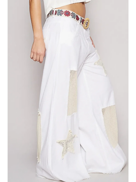 Babe Beachwear casual white summer resort pants with star patch details and wide leg fit