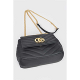 Black CG Logo Quilted Shoulder Bag with gold chain strap and chevron stitching design