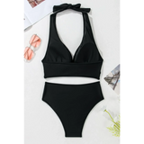 Beach Babes black swimsuit featuring cheeky bikini bottoms sporty top with halter neck design