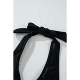 Black cheeky bikini bottoms sporty top by Beach Babes with tied halter neck design on white background