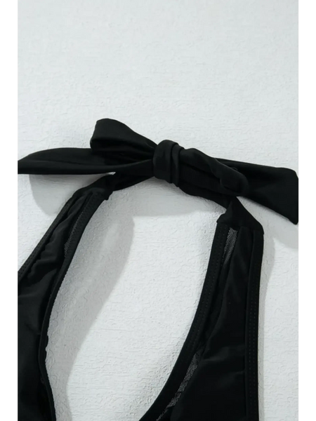 Black cheeky bikini bottoms sporty top by Beach Babes with tied halter neck design on white background