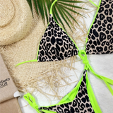 Beach Babes cheeky bottom triangle swimsuit with leopard print and neon green trim on straw and white background