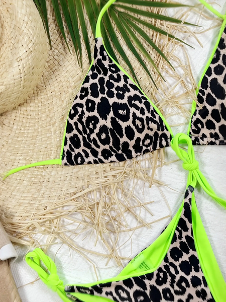 Beach Babes cheeky bottom triangle swimsuit with leopard print and neon green trim on straw and white background