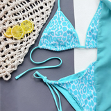 Beach Babes cheeky bottom triangle swimsuit in blue leopard print with adjustable ties and lemon slices
