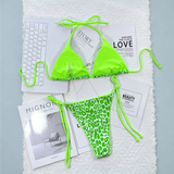 Beach Babes neon green cheeky bottom triangle swimsuit with solid triangle top and animal print bottom
