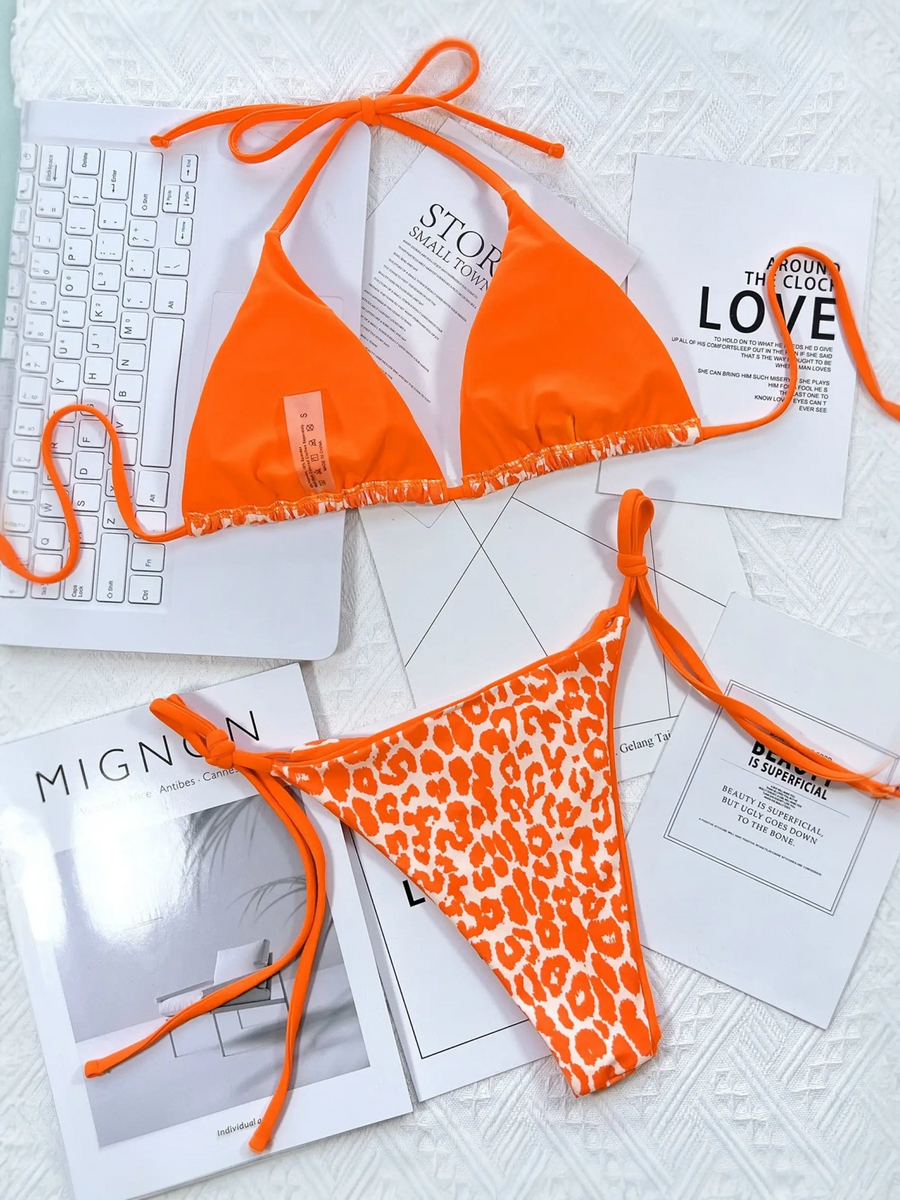 Beach Babes orange cheeky bottom triangle swimsuit with solid top and leopard print bottom