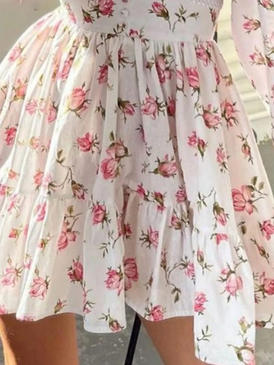 Image showing pleats floral mini dress featuring pink roses perfect as chic beachwear dresses for curvy women