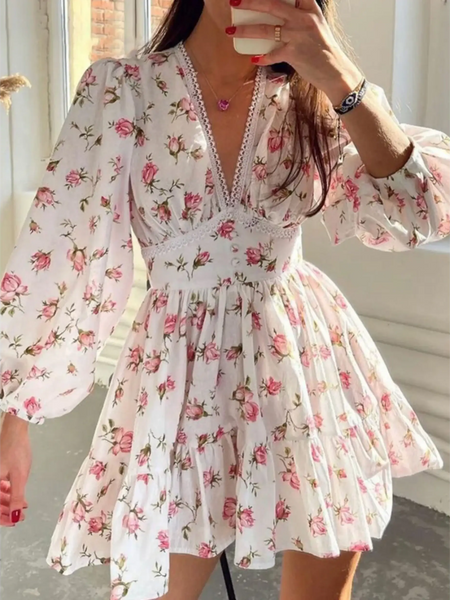 Pinl floral mini dress with puff sleeves designed as chic beachwear dresses for curvy women