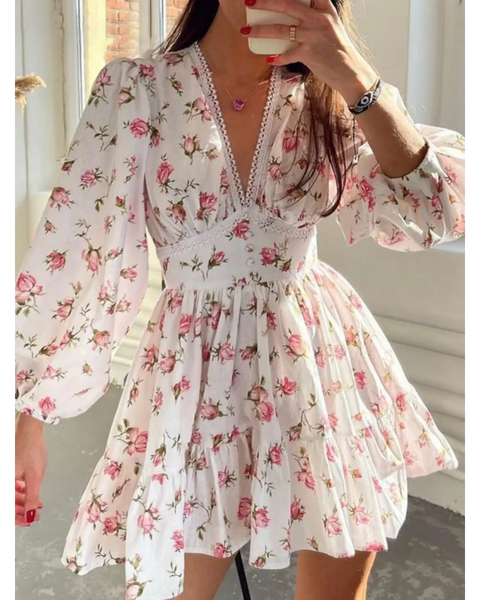 Pinl floral mini dress with puff sleeves designed as chic beachwear dresses for curvy women
