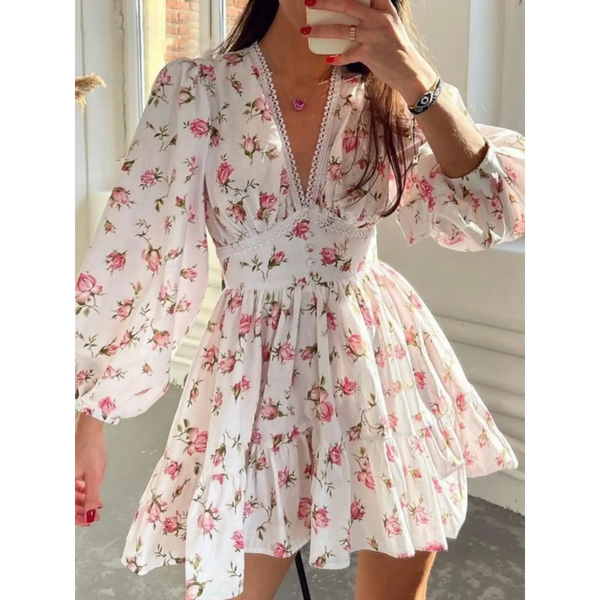 Pinl floral mini dress with puff sleeves designed as chic beachwear dresses for curvy women