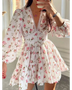 Pinl floral mini dress with puff sleeves designed as chic beachwear dresses for curvy women