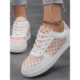 Trendsi chic beachwear sneakers in white and pink with patterned panels worn with light denim jeans