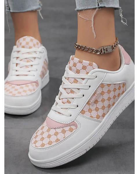 Trendsi chic beachwear sneakers in white and pink with patterned panels worn with light denim jeans
