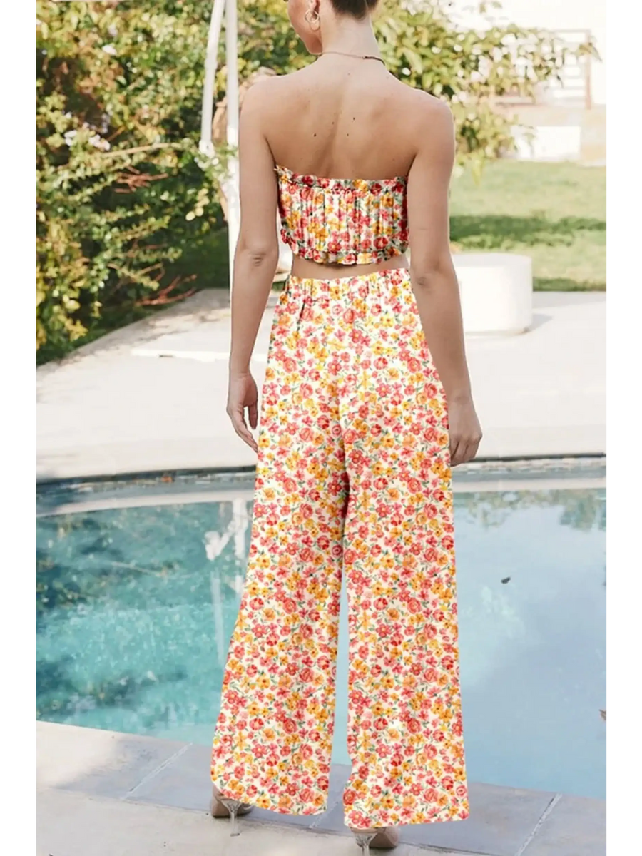 Trendsi floral chic boho beachwear set featuring a strapless top and wide leg pants by the pool