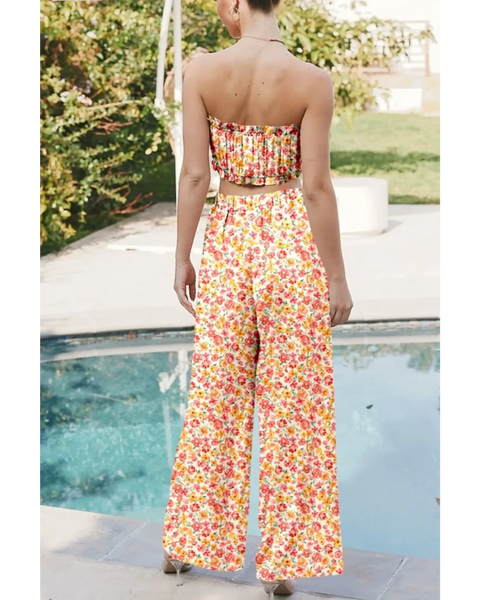 Trendsi floral chic boho beachwear set featuring a strapless top and wide leg pants by the pool