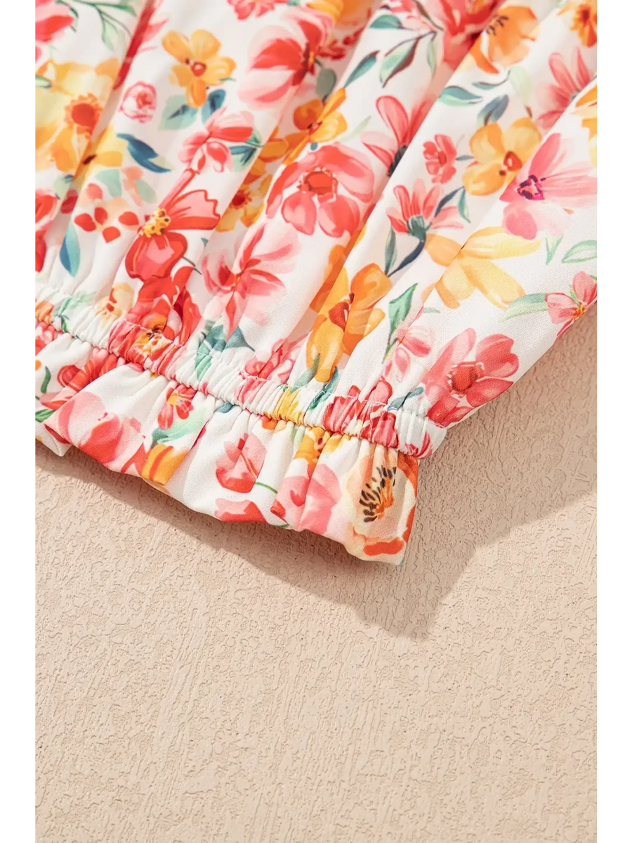Close-up of floral fabric cuff detail on chic boho beachwear set pants by Trendsi