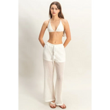 Trendsi chic cover up set for poolside featuring white crochet halter top and matching wide-leg pants