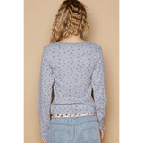 Trendsi chic long sleeve beachwear shirt in light gray with subtle floral pattern shown from back